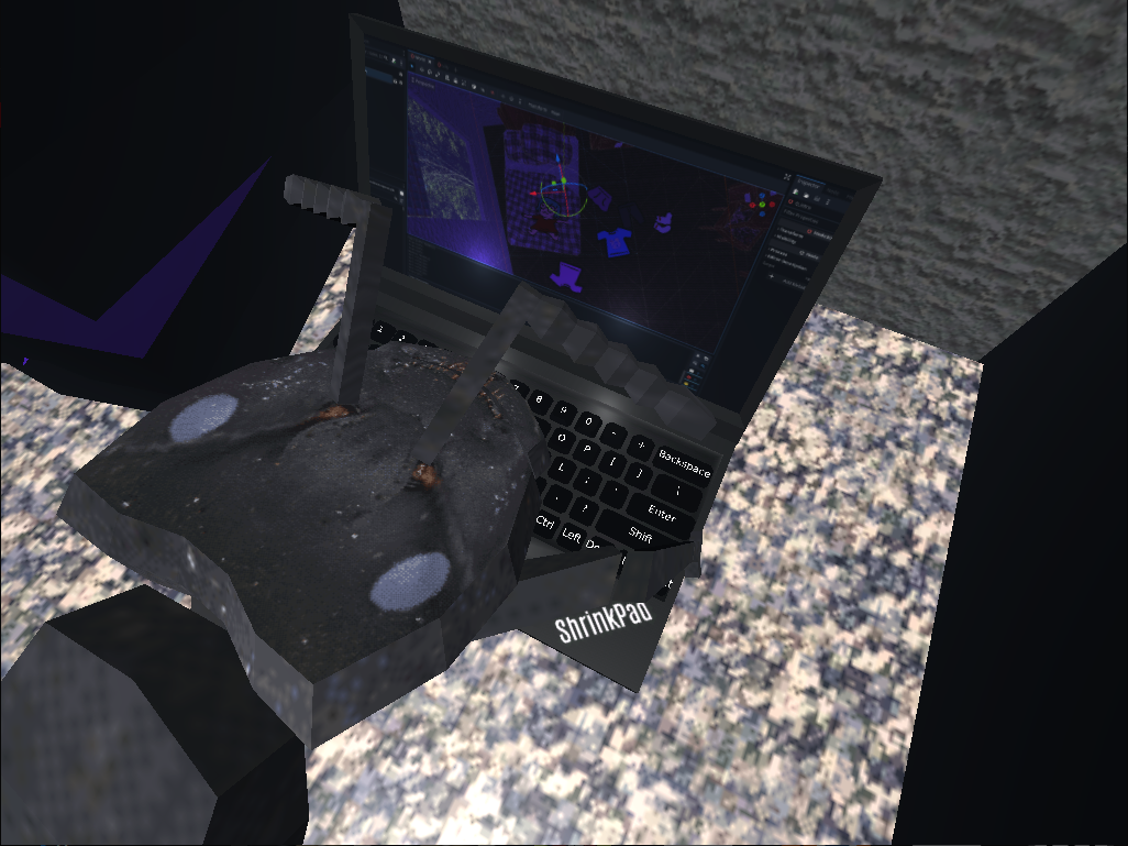 An Ant typing away at a shrinkpad laptop with a screen of the game development. An Ant typing away at a shrinkpad laptop with a screen of the game development.